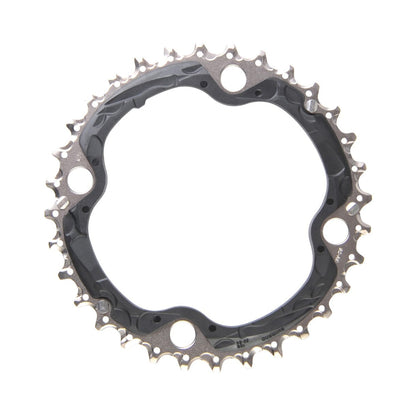 SHIMANO SLX M660/670/XT M780 -kampisarjan keskimmäinen eturatas, 10 vaihdetta, 4 pultin kiinnitys, 104 mm — eturatas valkoista taustaa vasten