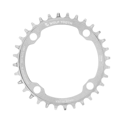 Zębatka jednorzędowa WOLF TOOTH DROP-STOP B 104 mm, surowe srebro — widok zębatki na białym tle