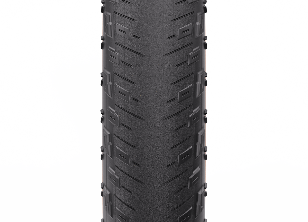 WTB BYWAY RS 50-dæk med beige dæksider – detalje af skulderknopperne og Stromm Aerotech-dæksiderne
