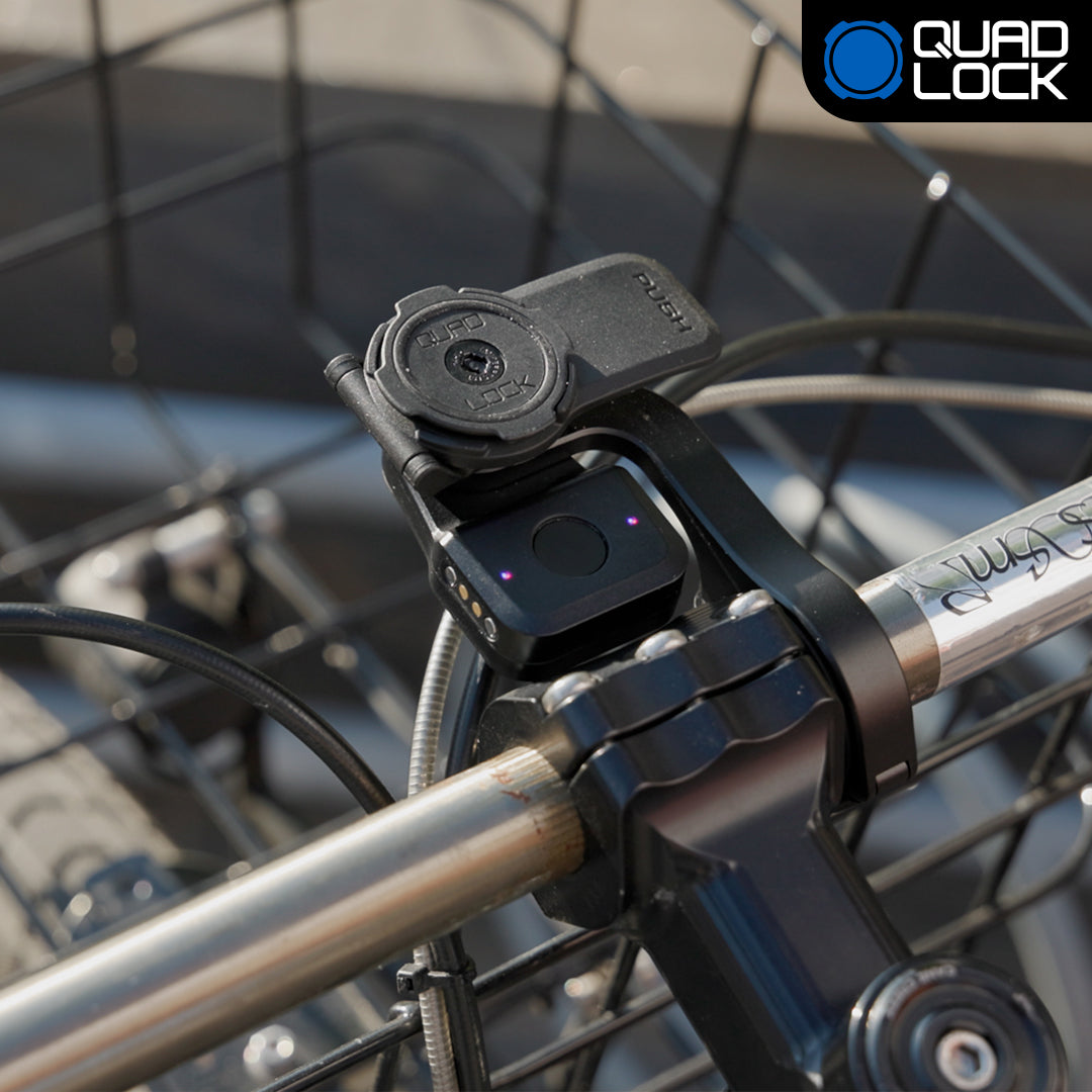 Alarmă și dispozitiv de localizare pentru bicicletă QUADLOCK BIKE ALARM & FINDER, montate pe o bicicletă