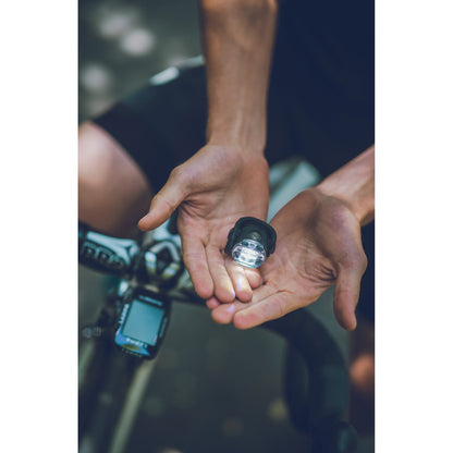 LEZYNE FEMTO USB C DRIVE front light held in a hand