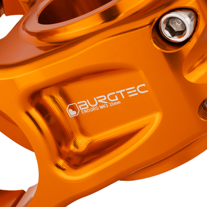 BURGTEC ENDURO MK3 stem in orange — machined body detail