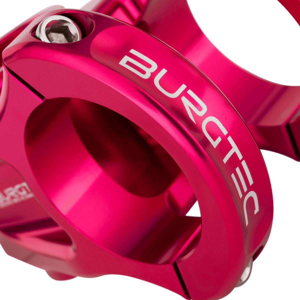 Attacco manubrio BURGTEC ENDURO MK3 rosa — dettaglio del morsetto del manubrio